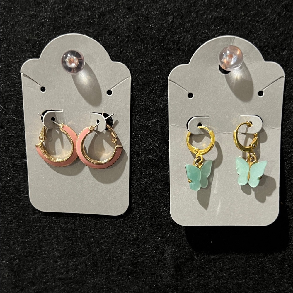 Two sets. Gold and Pink Hoop Earrings and Blue Butterfly Earrings